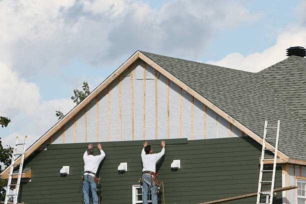 Professional Siding Repair technician working in Ashley, OH